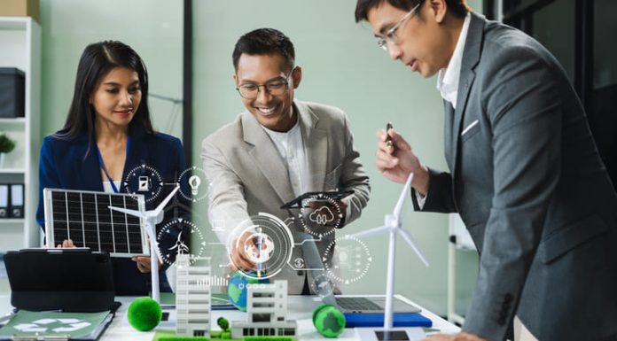 The Importance of Building Decarbonisation and 4 Ways Estate Leaders Can Get Started Engineer Teamwork Meeting, with partner on model building at company office working technology, Renewable energy-based green businesses and global warming.