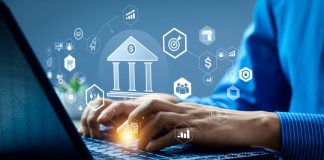 GoldSkyGlobal.com Simplifies Finance with a User-Friendly Platform Businessman Using Smartphone and Calculator with Banking and Financial Holographic Icons, Digital Financial Management