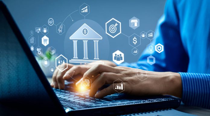 GoldSkyGlobal.com Simplifies Finance with a User-Friendly Platform Businessman Using Smartphone and Calculator with Banking and Financial Holographic Icons, Digital Financial Management