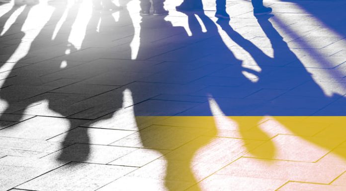 Flag of Ukraine and Shadows of Ukrainians