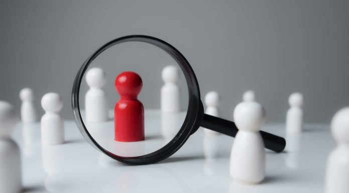 6 Job Description Red Flags Businesses Should Avoid When Hiring a magnifying glass looking to red wood people,Select a person in the team for a job