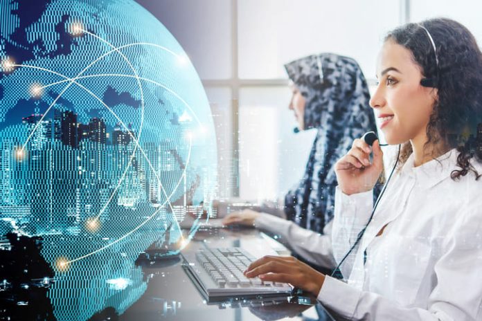 Beautiful business woman wearing microphone working at office as a telemarketing customer service agent with globe line networking connection.