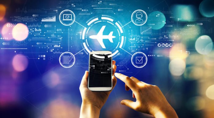 Flight ticket booking concept with person using a phone