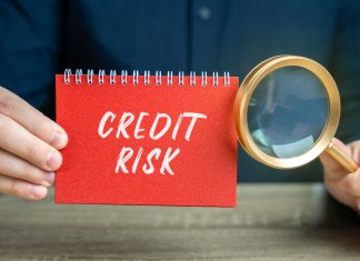 Credit Risk note with magnifying glass