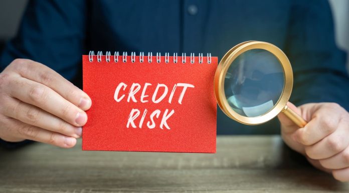 Credit Risk note with magnifying glass