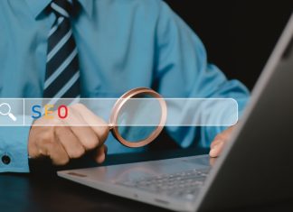 Human use laptop with Search engine optimization SEO networking