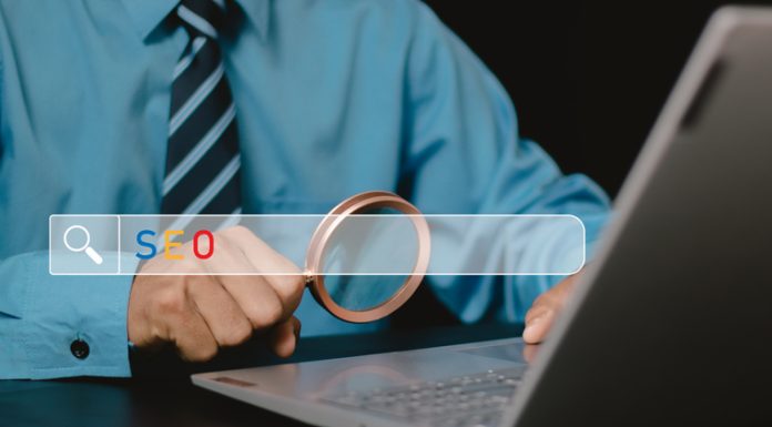 Human use laptop with Search engine optimization SEO networking