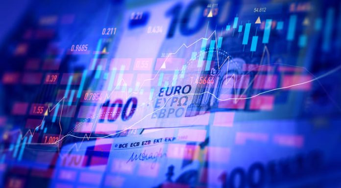 Euro banknotes with stock market chart graph