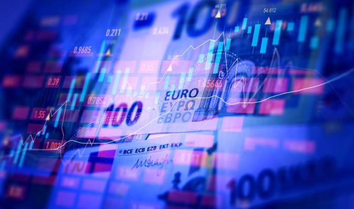 Euro banknotes with stock market chart graph