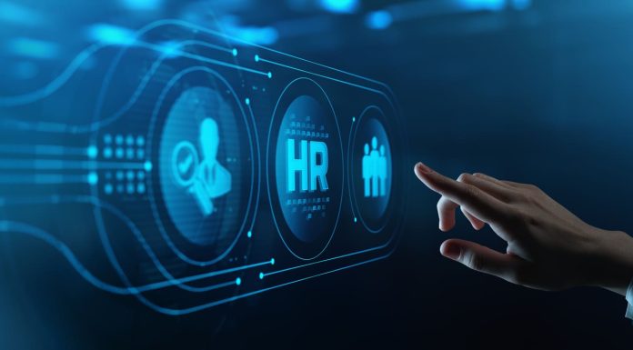 Navigating HR Tech: How HR Software Enhances Employee Experience and Business Growth software- Human Hand Touching Futuristic Virtual Screen
