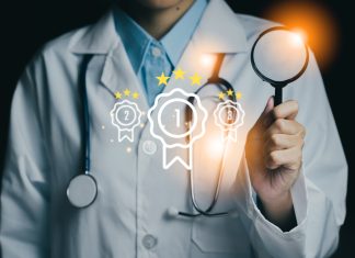 Medical professional holding a magnifying glass device , symbolizing quality and excellence in healthcare.