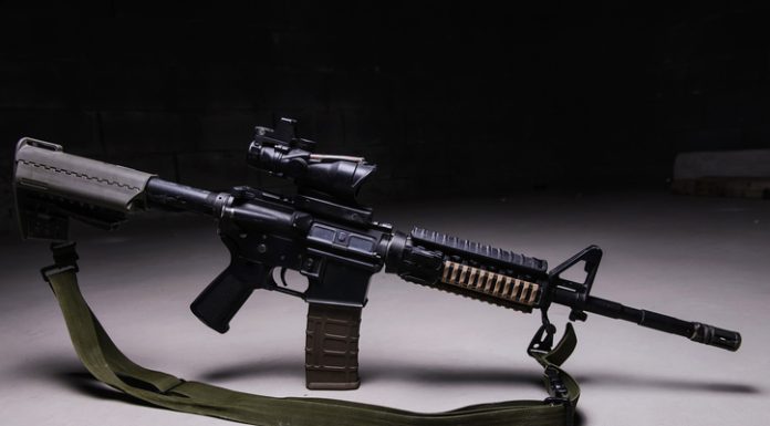 Why is the Criterion Core 14.5 Barrel a Top Choice for Tactical Shooters? Army assault rifle with optical sight and tactical belt