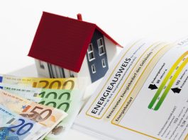 Should the Minimum EPC Rating Requirements be Scrapped for England Rental Properties? Model House property With Energy Performance Certificate And Euro Notes