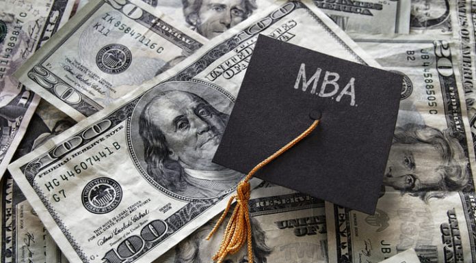 Top 5 MBA Programs for Landing a Six-Figure Salary Minil MBA graduation cap on assorted cash -Masters of Business Administration programs