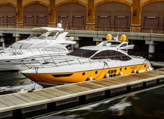 A Comprehensive Guide to the Most Popular Yacht Charter Destinations in Dubai white yachts on a pond