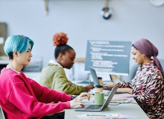 Are Businesses Failing to Adapt to Gen Z?  Young generation using computer in office