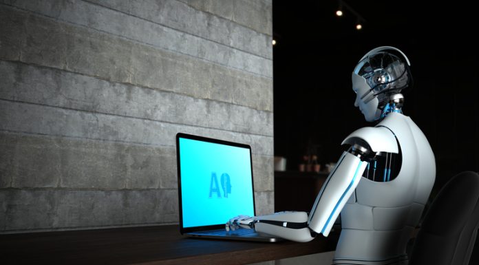 AI robot working on computer. Agentic AI concept