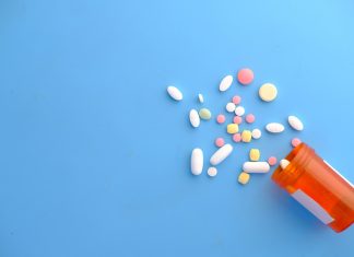 Close up of many colorful pills and medicine.