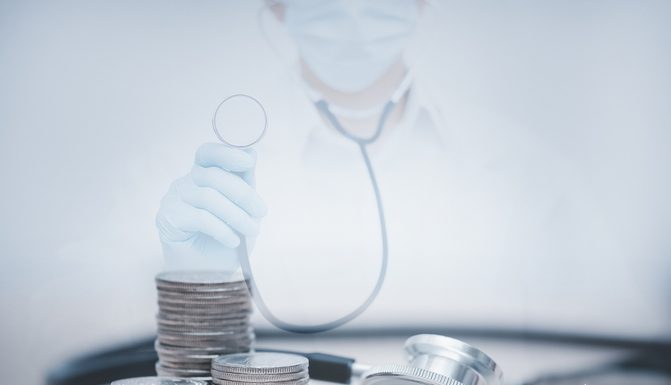 Armistice Capital Expands Healthcare Holdings as Institutional Investors Target AI, Biotech and MedTech Sectors stethoscope checking stack of money coins arranged as a graph on wooden table,saving and manage money for healthcare, life insurance business technology and medtech