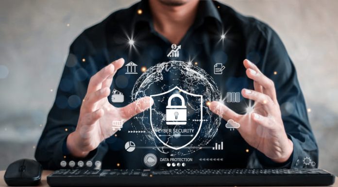 Businessman holding shield protect icon. Protection network security computer and safe your data concept, lock symbol, concept about security, cybersecurity and protection against dangers.