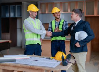Hire Engineers: The Best Way to Build Your Engineering Team Engineers shaking hands after hiring
