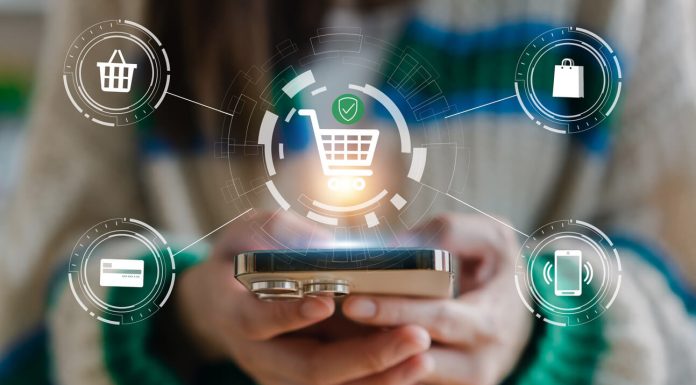 How Expandable Merchandising Trailers Are Shaping Mobile Retail Strategies Human use phone with fashion online shopping