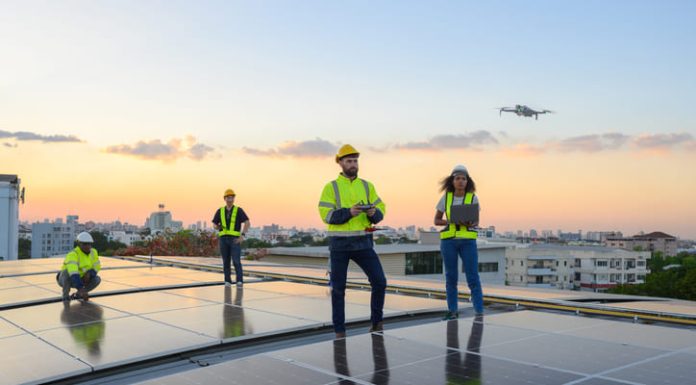 Advancing Solar Energy: How AI and Drone Technology Are Revolutionizing Solar Plant Monitoring A team of engineers flies a drone to plan the installation of an outdoor solar panel system. Installing solar cells on the roof Solar panels on the roof Workers install eco-technology solar power plan.