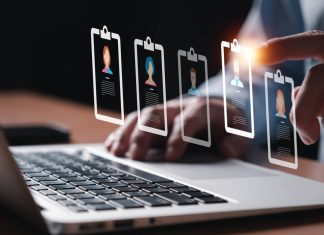 Entrepreneur using electronic devices hiring