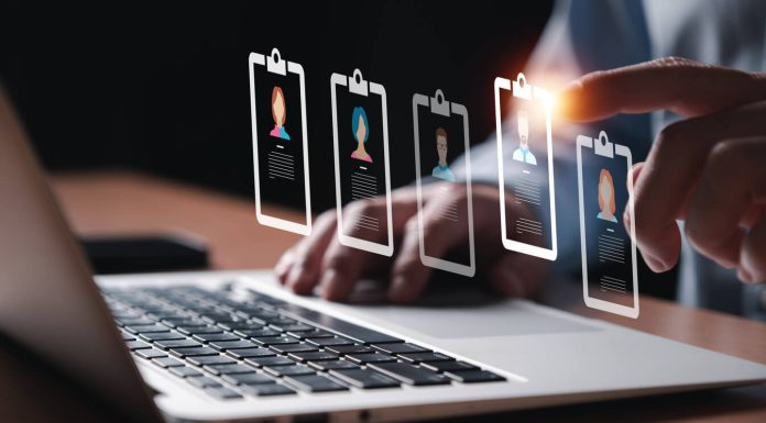 Entrepreneur using electronic devices hiring