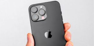 Hand holding iphone 14 pro max