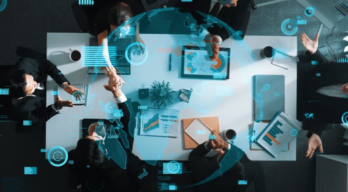 Top down aerial view of skilled business team listening manager present global networking system while giving a high five to encourage or motivate team for Continuity in business.