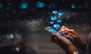 Young woman using smart phone, social media marketing , networking