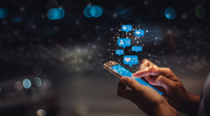 Young woman using smart phone, social media marketing , networking