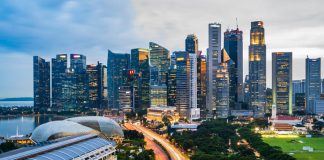 High Angle View Of Road Amidst Buildings In City Against Sky. Urban living in singapore