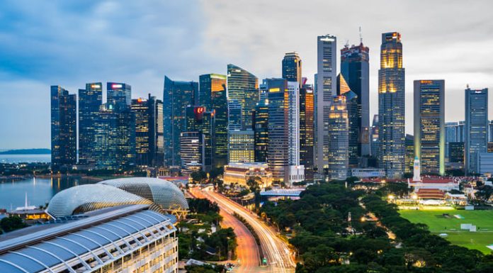 Urban Living in Singapore: Embracing the Modern Lifestyle High Angle View Of Road Amidst Buildings In City Against Sky. Urban living in singapore