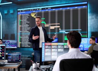 Building Trust in an Era of Data Overload: The Case for Better Information Management Multiracial executive training room presenting data