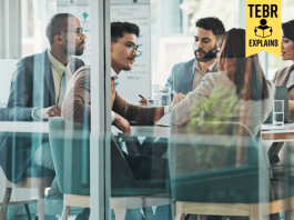 How Do Companies Get Valued? (And What’s a Unicorn?) Glass, finance or business people meeting with project for feedback, companies discussion or teamwork