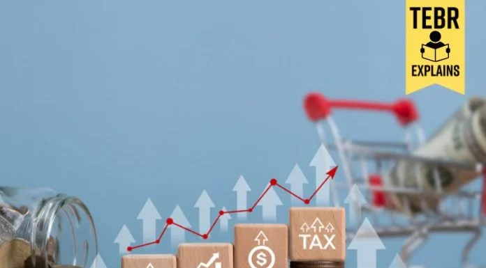 Inflation concept on wooden block for the FED consider interest rate and prices hike, world economics and US dollar inflation control