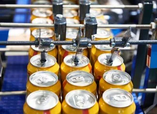 Can filling machine in the factory