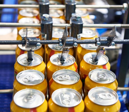 Can filling machine in the factory