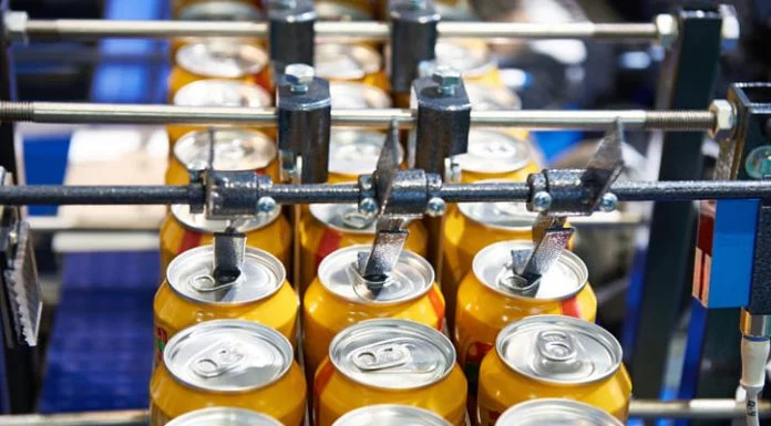 Can filling machine in the factory