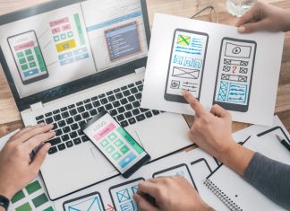 Web App Development Cost Estimation Designers drawing website ux app project development.