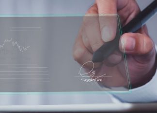 Global Electronic Signature Laws: How Do They Work? Businessman use electronic pen sign signature on electronic