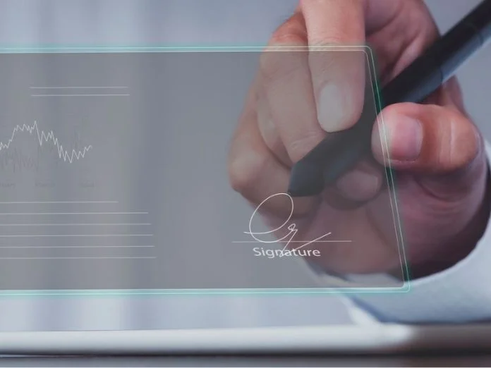 Businessman use electronic pen sign signature on electronic