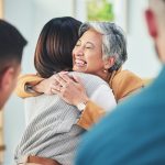 Corporate men, staff and colleagues with embrace for team building, lead, welcome and happy together