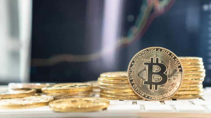 iStock-2175541631 (1) BTC Bitcoin Cryptocurrency with altcoin digital coin crypto currency defi p2p decentralized fintech market technology on trading application chart on computer or mobile tablet