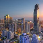 Bangkok city downtown,Mahanakorn tower with sunset sky