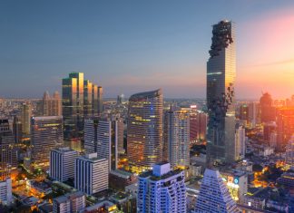 Bangkok city downtown,Mahanakorn tower with sunset sky