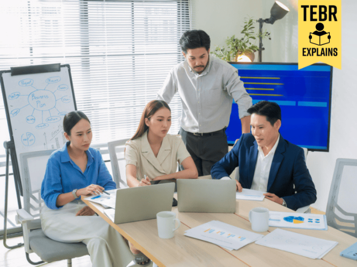 Colleagues having a meeting in office boardroom asian young businessman lead his team to discuss their projects Businesswoman and businessman leading a meeting in office.Business incubator concept