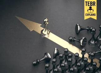 Golden pawn beating competition over black background. Business competitive